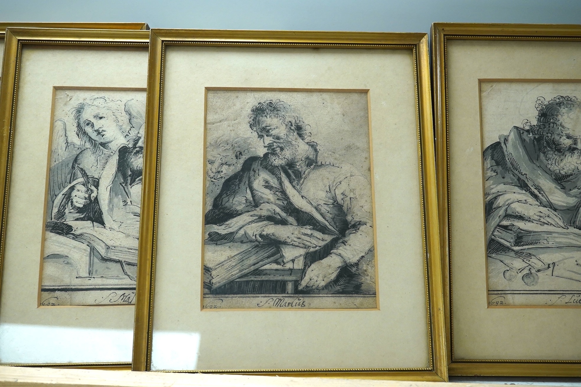 Manner of Guido Reni (Italian 1575-1642), set of four Old Master monochrome ink and washes, Four saints including St. Lucas and St. Matthew, each bearing date 1692, 17 x 12cm. Condition - fair to good for age